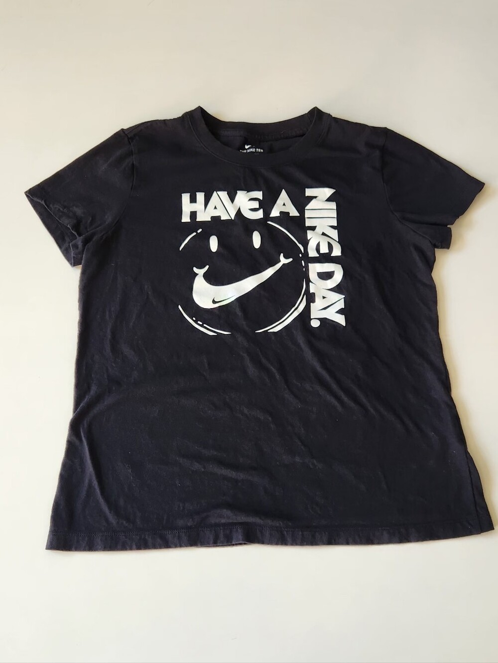 Nike Black Tee with White 'Have A Nike Day' Smiley Graphic
